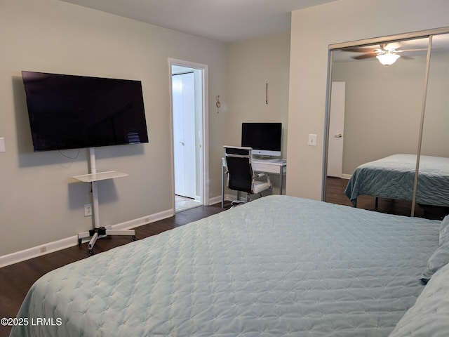 bedroom with ceiling fan, dark hardwood / wood-style floors, and a closet