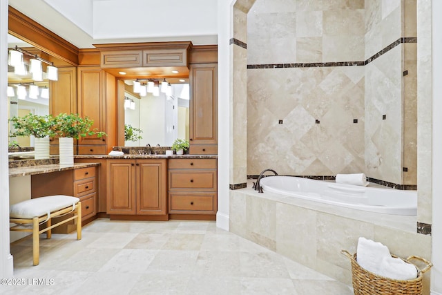 full bath with vanity and a garden tub