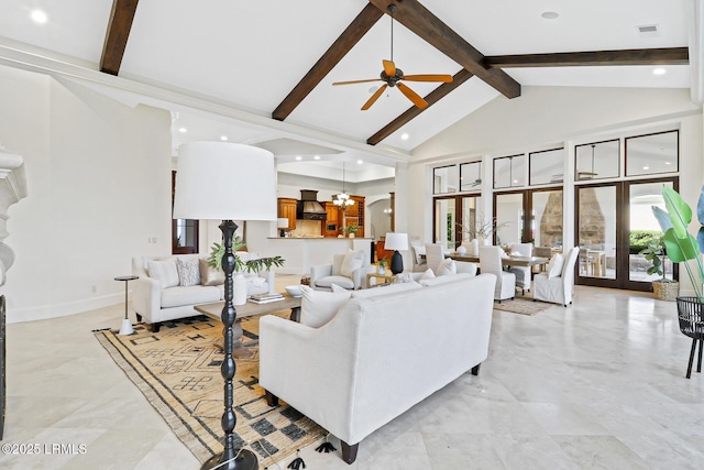 living room with baseboards, high vaulted ceiling, recessed lighting, beamed ceiling, and ceiling fan with notable chandelier