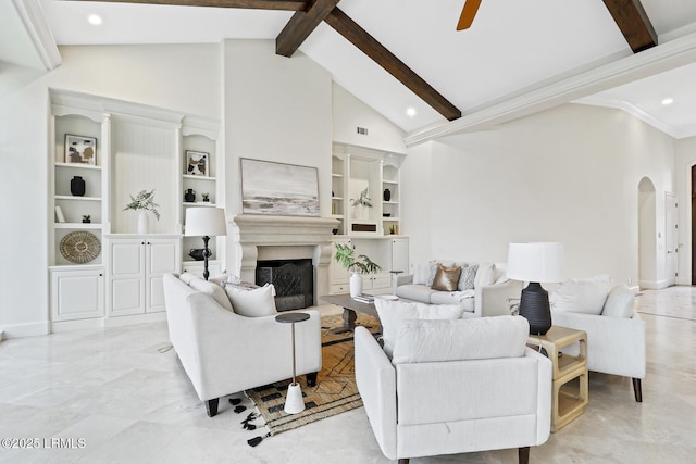 living room with beamed ceiling, a fireplace, arched walkways, high vaulted ceiling, and a ceiling fan