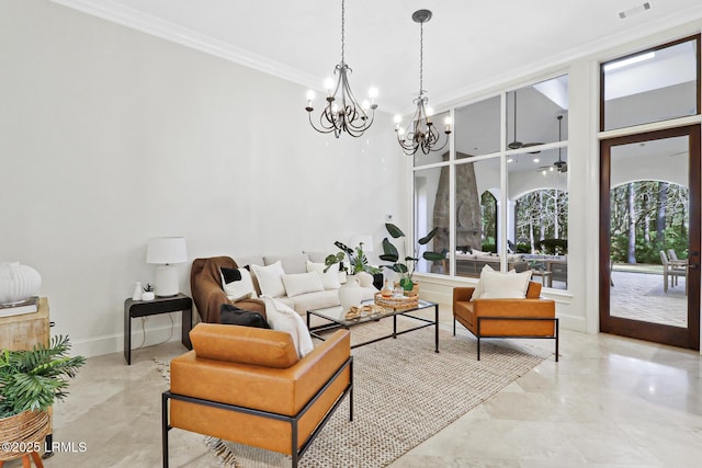 living area with visible vents, baseboards, a notable chandelier, and ornamental molding