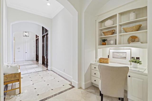 office area featuring built in shelves, crown molding, baseboards, recessed lighting, and arched walkways