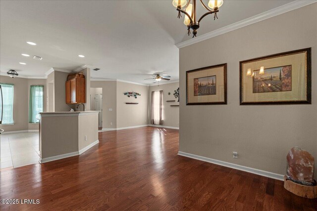 52 Summerplace Dr, Bluffton, SC 29909 - unfurnished living room with a sink, baseboards, ceiling fan, ornamental molding, and light wood-type flooring