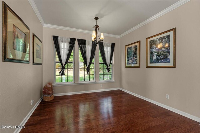52 Summerplace Dr, Bluffton, SC 29909 - unfurnished dining area with a chandelier, dark wood-style flooring, ornamental molding, and baseboards