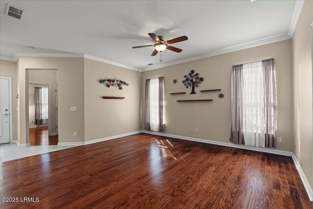 52 Summerplace Dr, Bluffton, SC 29909 - spare room featuring a ceiling fan, healthy amount of natural light, wood finished floors, crown molding, and baseboards