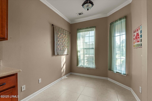 52 Summerplace Dr, Bluffton, SC 29909 - unfurnished dining area with crown molding, light tile patterned floors, and baseboards
