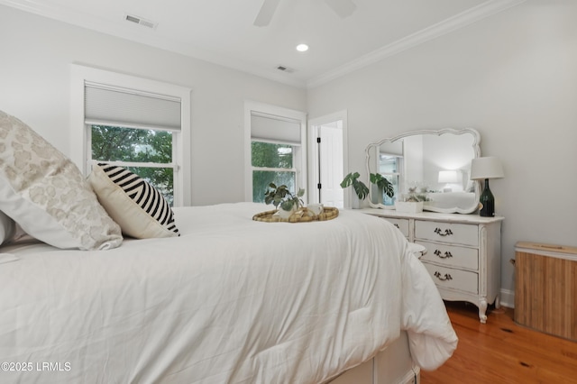 89 Bostick Cir, Beaufort, SC 29902 - bedroom featuring wood finished floors, ornamental molding, recessed lighting, and ceiling fan