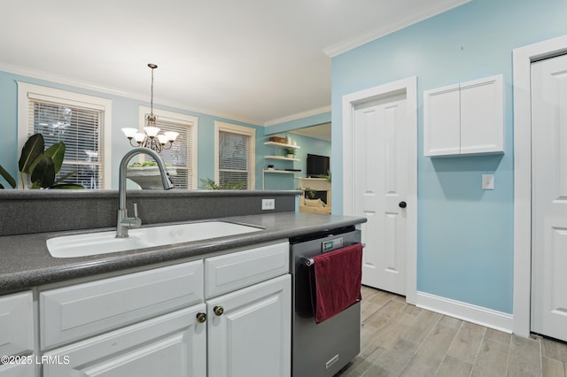 89 Bostick Cir, Beaufort, SC 29902 - kitchen featuring stainless steel dishwasher, a sink, white cabinets, ornamental molding, and dark countertops