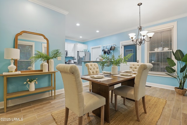 89 Bostick Cir, Beaufort, SC 29902 - dining area featuring a chandelier, light wood finished floors, baseboards, ornamental molding, and recessed lighting