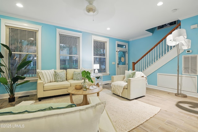 89 Bostick Cir, Beaufort, SC 29902 - living room with baseboards, crown molding, recessed lighting, wood finished floors, and stairs