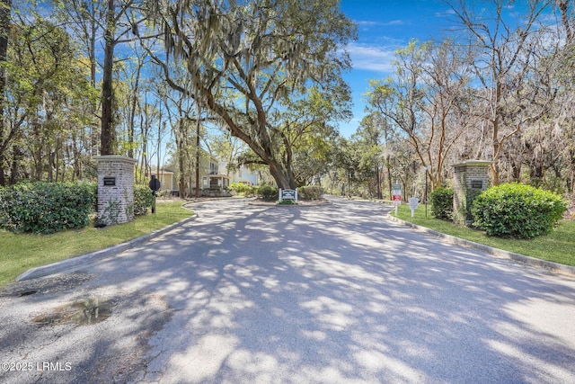 89 Bostick Cir, Beaufort, SC 29902 - view of asphalt road featuring curbs