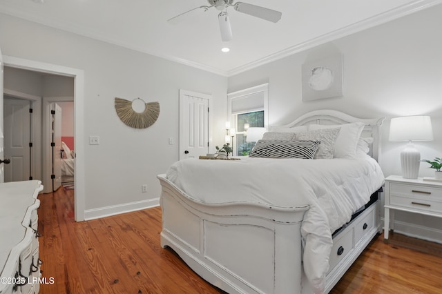 89 Bostick Cir, Beaufort, SC 29902 - bedroom with a closet, ornamental molding, wood finished floors, baseboards, and ceiling fan