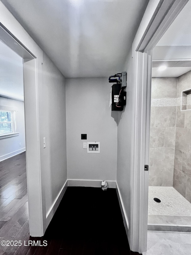 193 Paige Point Rd, Seabrook, SC 29940 - washroom featuring washer hookup and dark wood finished floors