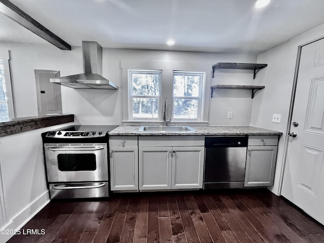 193 Paige Point Rd, Seabrook, SC 29940 - kitchen with appliances with stainless steel finishes, wall chimney exhaust hood, dark wood-type flooring, open shelves, and recessed lighting