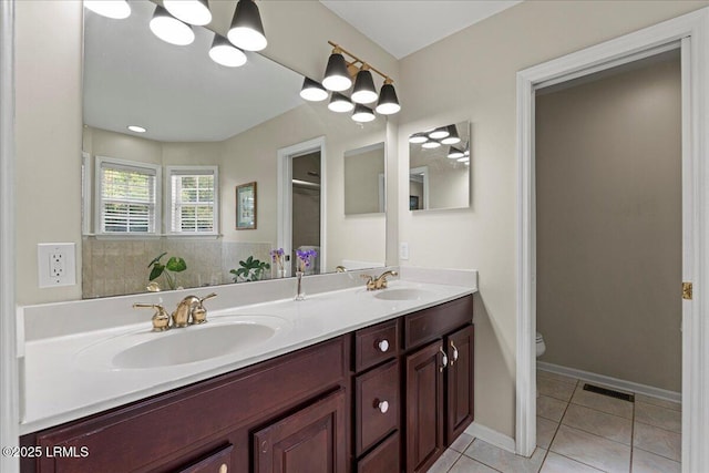15 Walling Grove Rd, Beaufort, SC 29907 - bathroom featuring double vanity, tile patterned flooring, and toilet