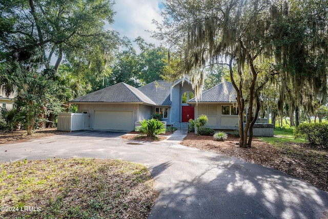 single story home with a garage