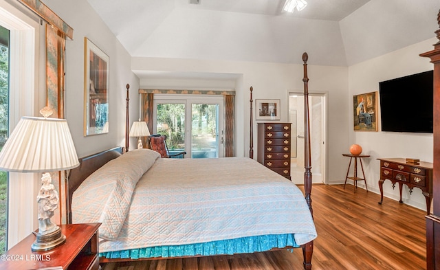 bedroom with hardwood / wood-style floors, lofted ceiling, and access to outside