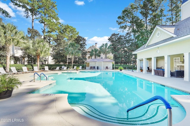 view of pool featuring a patio