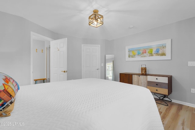 bedroom with light wood-type flooring