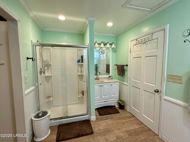 26 Mallard St, Ridgeland, SC 29936 - full bath with a stall shower, vanity, crown molding, and wood finished floors