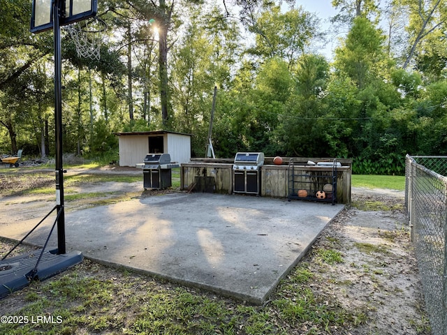 26 Mallard St, Ridgeland, SC 29936 - view of patio / terrace featuring area for grilling and a storage shed