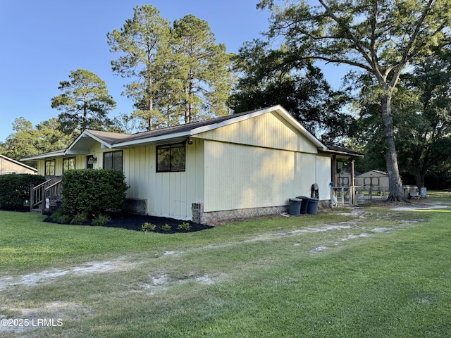 26 Mallard St, Ridgeland, SC 29936 - view of home's exterior featuring a lawn