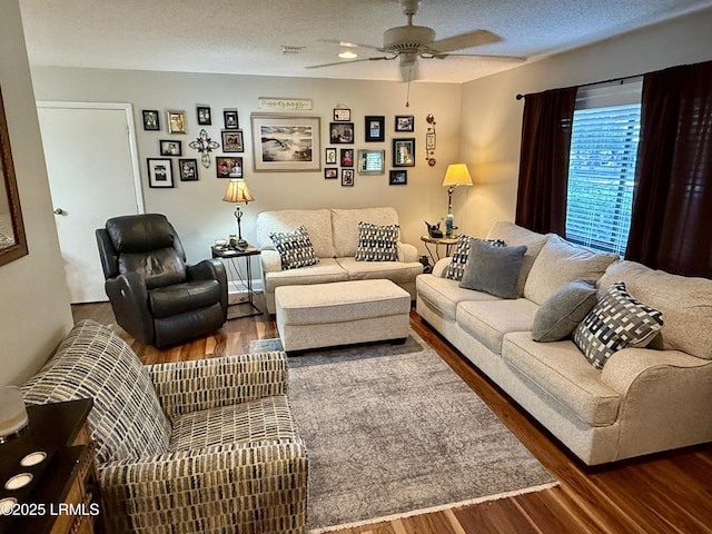26 Mallard St, Ridgeland, SC 29936 - living area with wood finished floors, ceiling fan, and a textured ceiling