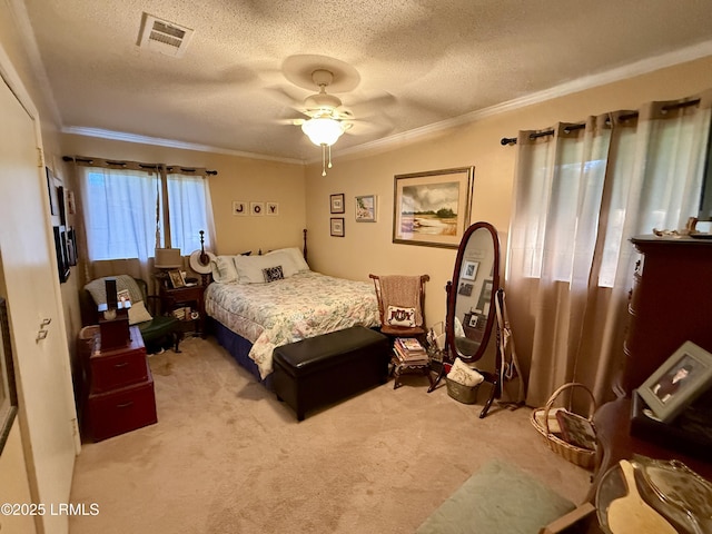 26 Mallard St, Ridgeland, SC 29936 - bedroom with ornamental molding, light colored carpet, a textured ceiling, and ceiling fan
