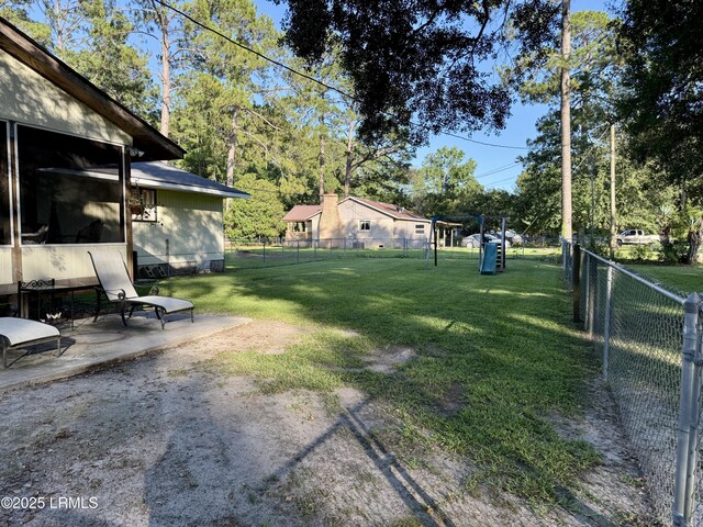 26 Mallard St, Ridgeland, SC 29936 - fenced backyard with a patio