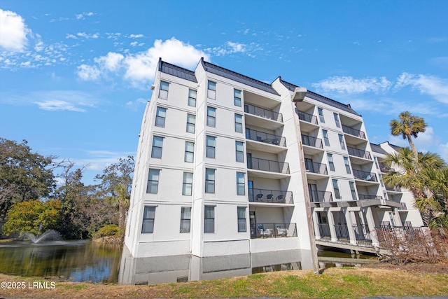 view of property with a water view