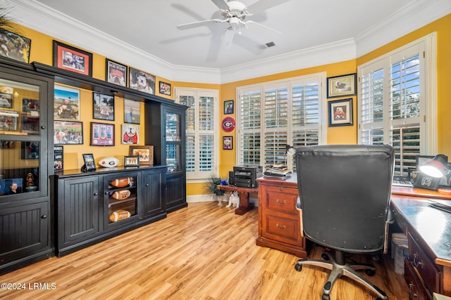 office space with ornamental molding, ceiling fan, and light hardwood / wood-style floors