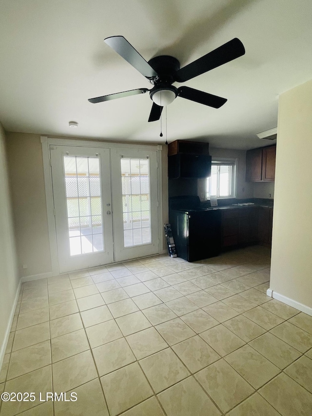 3005 Shell Point Rd, Beaufort, SC 29906 - unfurnished living room featuring light tile patterned flooring, ceiling fan, and french doors