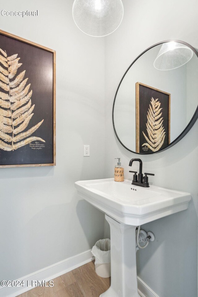 bathroom featuring hardwood / wood-style floors and sink