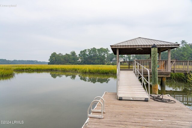 view of dock featuring a water view and a gazebo