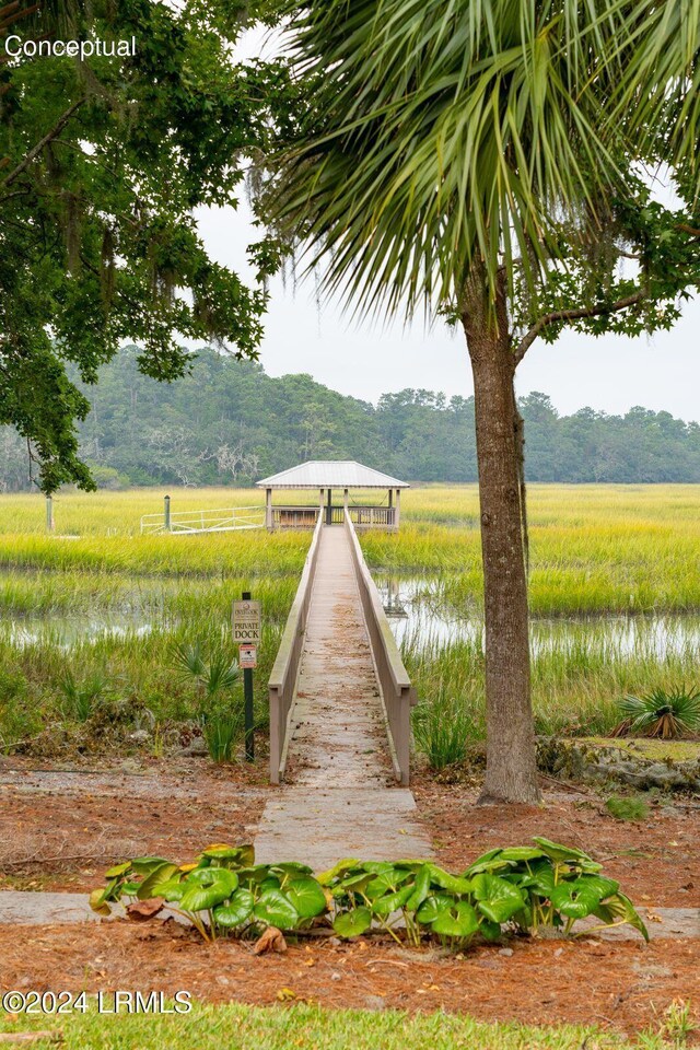 view of yard featuring a rural view and a water view