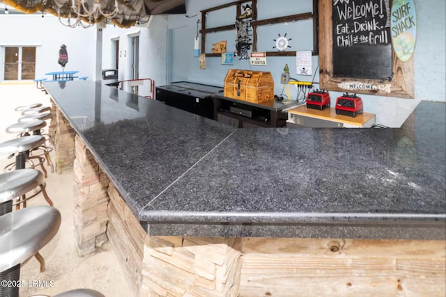 663 William Hilton Pkwy Unit 442, Hilton Head Island, SC 29928 - bar with a chandelier