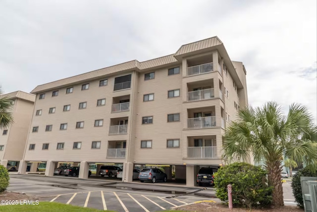 663 William Hilton Pkwy Unit 442, Hilton Head Island, SC 29928 - view of apartment building / complex featuring covered parking