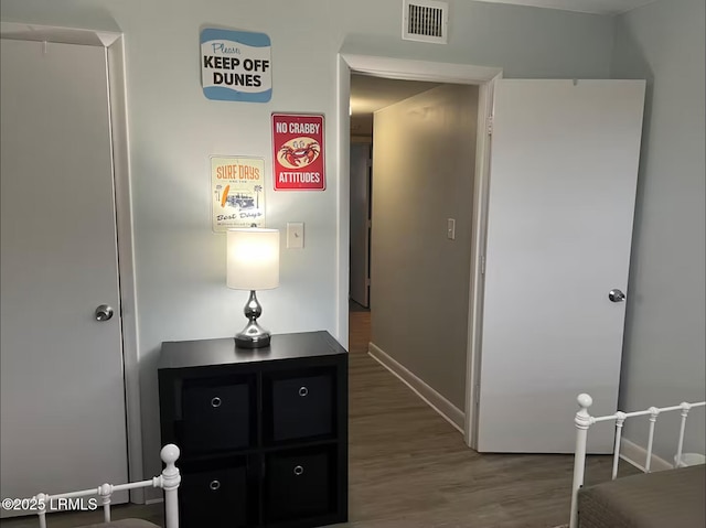 663 William Hilton Pkwy Unit 442, Hilton Head Island, SC 29928 - hallway featuring wood finished floors and baseboards