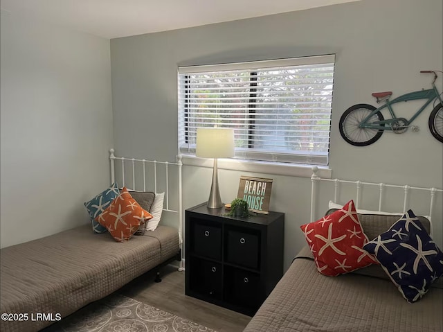 663 William Hilton Pkwy Unit 442, Hilton Head Island, SC 29928 - bedroom featuring multiple windows and wood finished floors