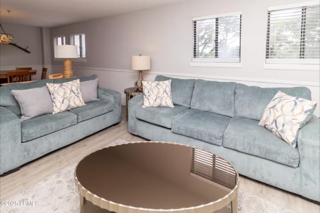 663 William Hilton Pkwy Unit 442, Hilton Head Island, SC 29928 - living area featuring wainscoting and wood finished floors