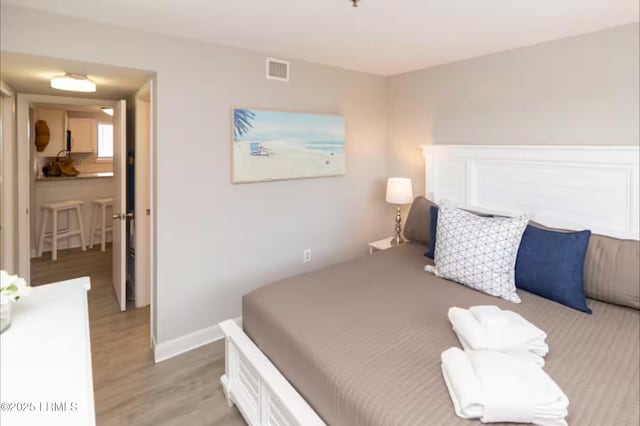 663 William Hilton Pkwy Unit 442, Hilton Head Island, SC 29928 - bedroom with light wood-style flooring