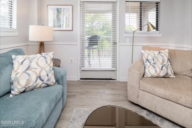 663 William Hilton Pkwy Unit 442, Hilton Head Island, SC 29928 - living room with wood finished floors and plenty of natural light