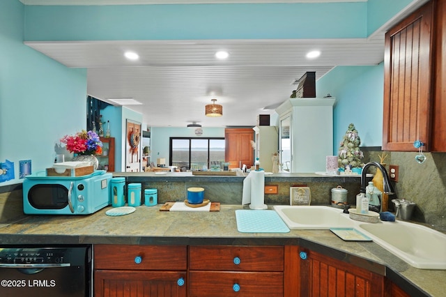 31 Anchorage Pt Unit 31, Hilton Head Island, SC 29928 - kitchen featuring a peninsula, recessed lighting, backsplash, and black dishwasher