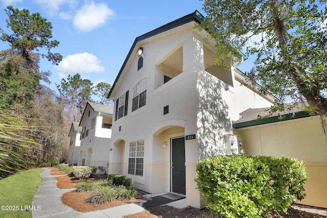 view of front of property featuring stucco siding