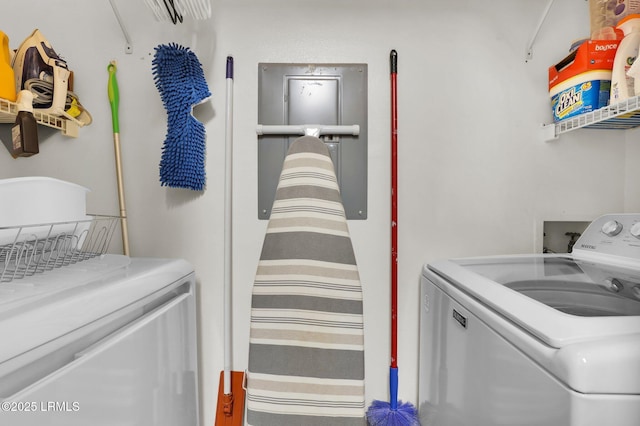 laundry room featuring laundry area and washer and clothes dryer