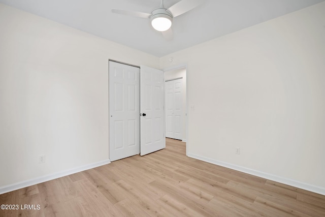 7 Grandiflora Ln, Beaufort, SC 29907 - unfurnished bedroom featuring light wood finished floors, baseboards, a ceiling fan, and a closet