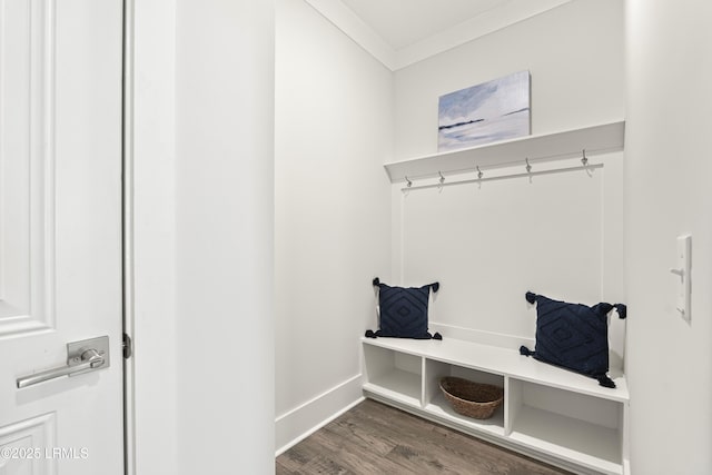 mudroom featuring ornamental molding, baseboards, and wood finished floors