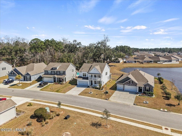 birds eye view of property with a residential view