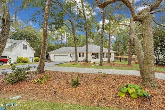 ranch-style house featuring a garage