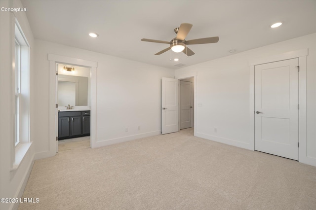 427 Parkside Commons, Bluffton, SC 29910 - unfurnished bedroom featuring light colored carpet, recessed lighting, ensuite bathroom, and a ceiling fan